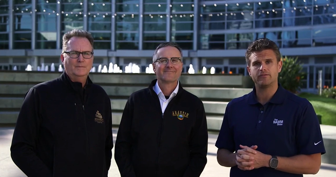 (L-R) Tom Morton, executive director of the Anaheim Convention Center; Mike Lyster, chief communications officer for City of Anaheim; and John Mlynczak, president/CEO of NAMM. Photo courtesy of NAMM.